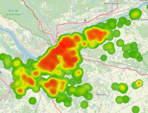 Heatmap displaying university student concentration across Ottawa CSD. Distinct red and orange hotspots indicate high-density student clusters surrounding post-secondary campuses, dispersed among lower-density green zones representing the broader urban and public sector workforce areas.