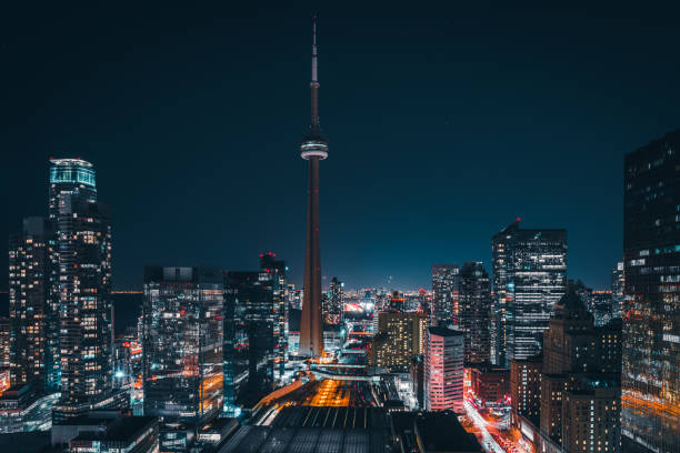 Toronto financial district Epic futuristic and modern skyline views of downtown Toronto with the train tracks leading your eye to office buildings and condominiums.